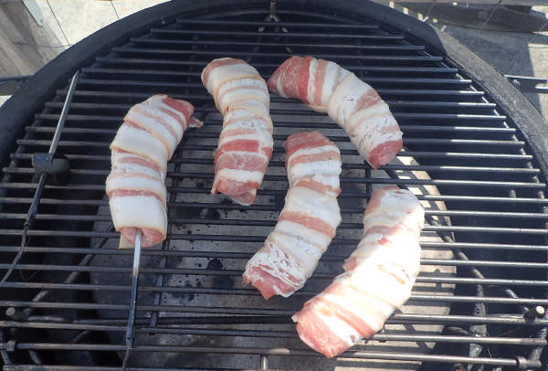 kamado joe smoked bacon wrapped bratwursts
