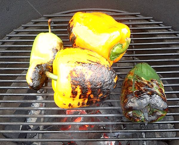 Fire roasting the peppers to get a good flavorful char.