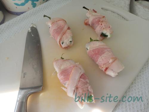 bacon wrapped jalapeno poppers ready for the grill