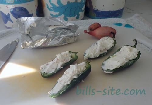 cream cheese stuffed jalapeno poppers ready for some bacon