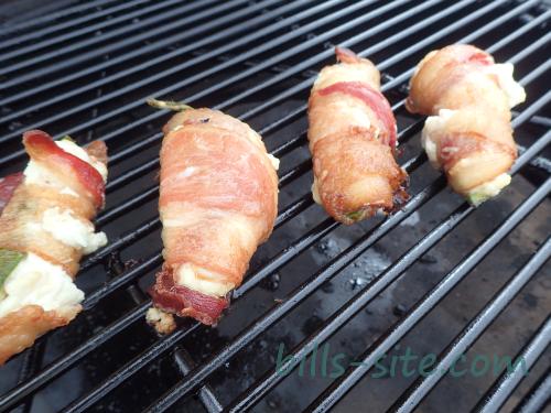 jalapeno poppers on the grill with cherry wood for smoke flavor 