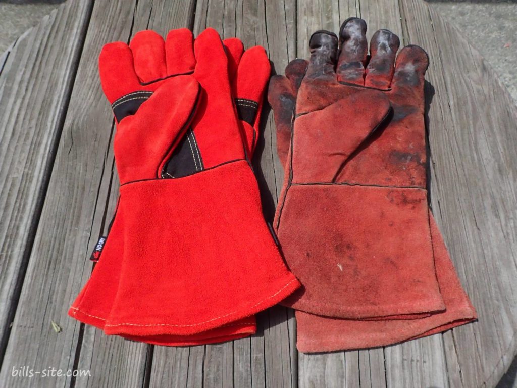 NoCry heat resistant gloves next to worn out gloves
