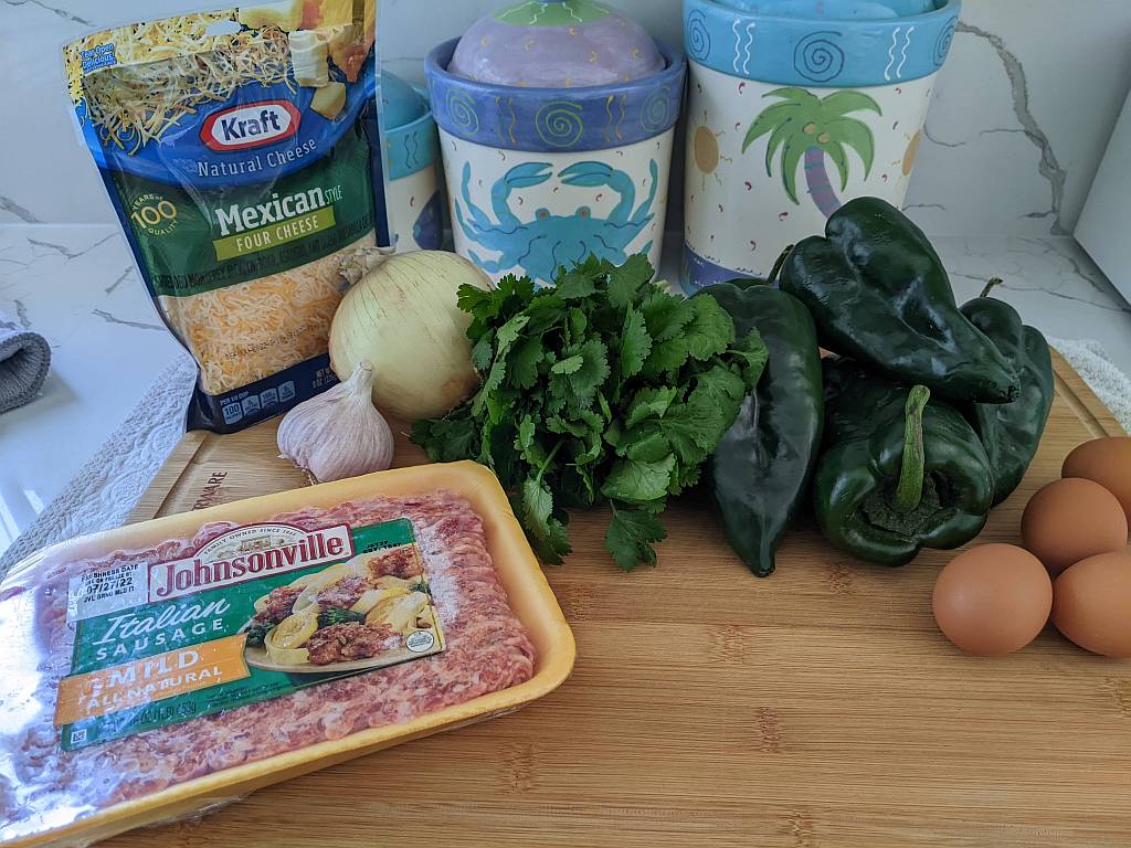 chili relleno casserole ingredients on a cutting board
