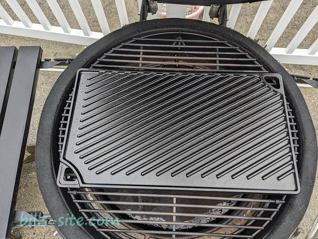 we're looking at the grilling side as we are seasoning the Lodge LDP3 reversible griddle on the Kamado Joe Classic
